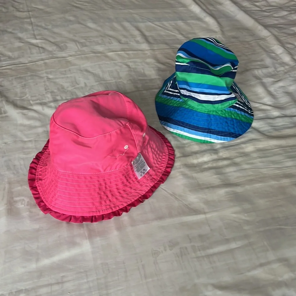 UV Skinz kids fuchsia and blue bucket hats in size 6 and 7